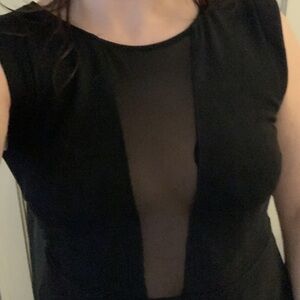 Classic A-line black dress with a deep-plunge front and mesh back